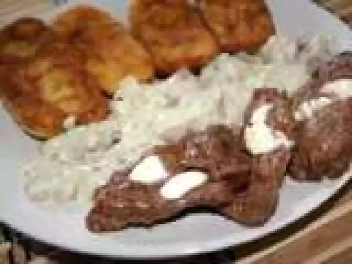 Snitel de vitel cu sos de ciuperci