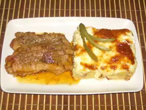 Rețetă Cartofi frantuzesti cu pulpa de porc