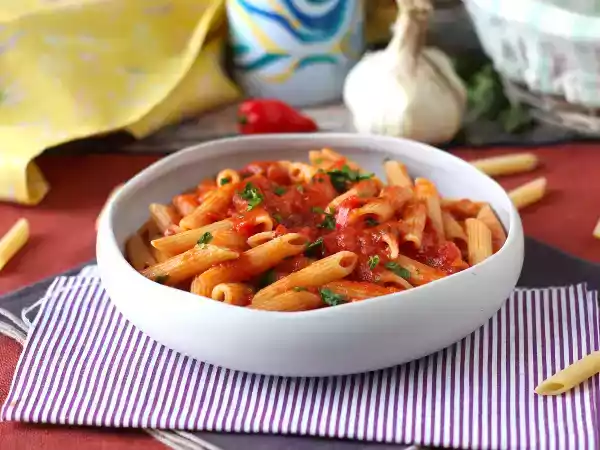Rețetă Penne all'arrabbiata: un clasic italian reconfortant!