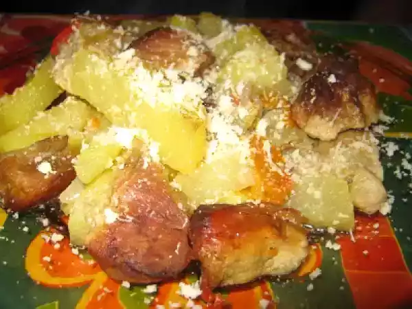 Rețetă Friptura de porc pe pat de legume