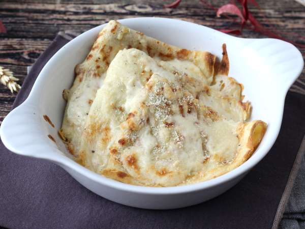 Crespelle cu ricotta și ciuperci: rețeta vegetariană cremoasă perfectă pentru fiecare ocazie - Preparare etapa 13