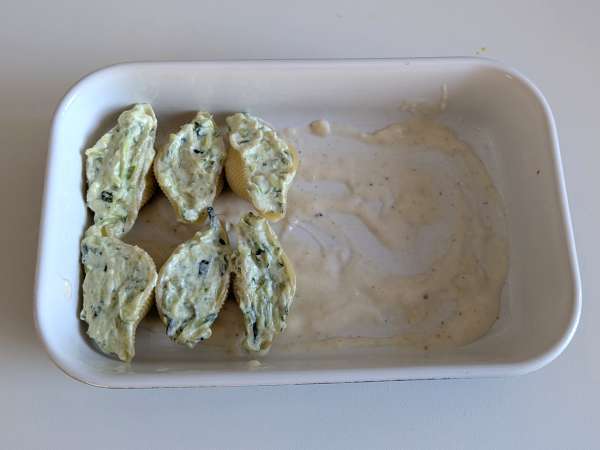 Conchiglioni umplute cu ricotta, dovlecei și lămâie: cremoase și gratinate în cuptor - Preparare etapa 7