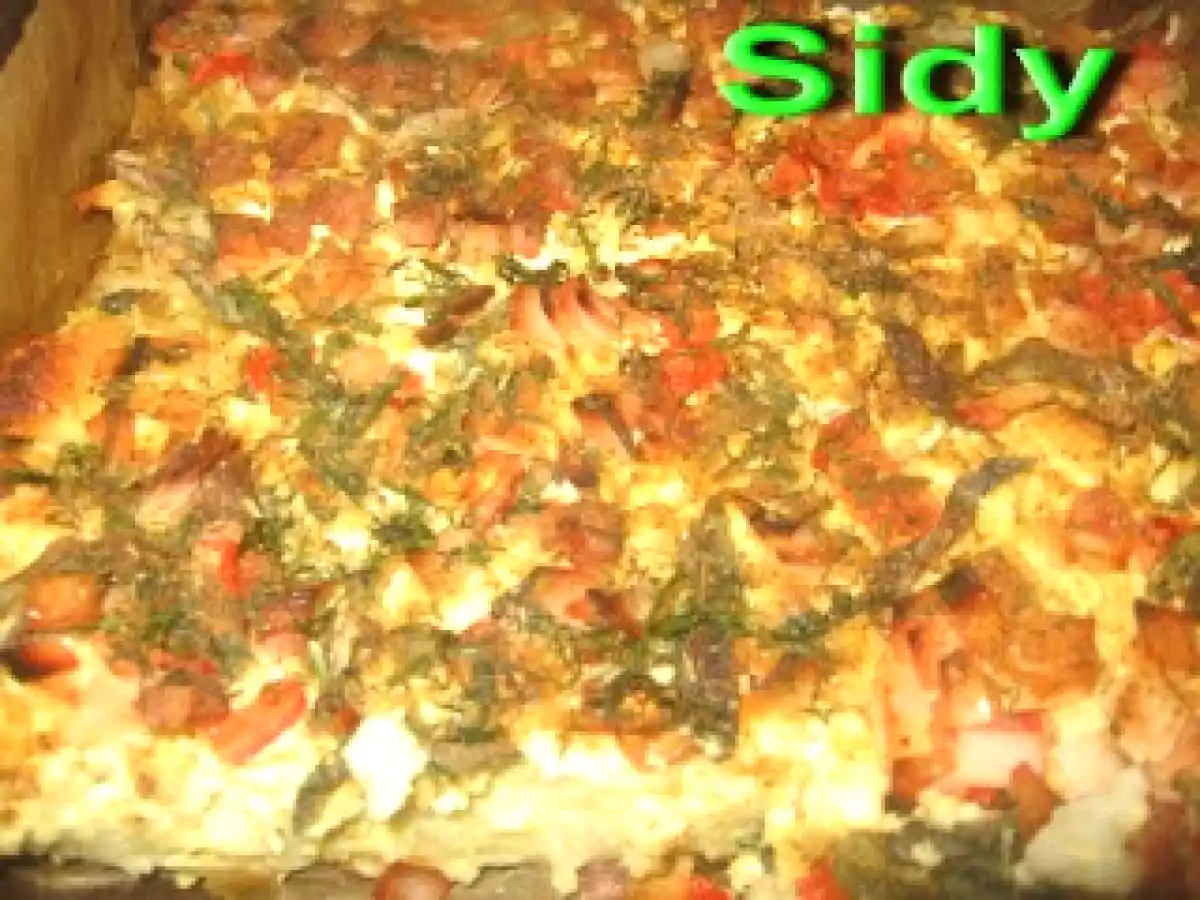 Budinca de taitei cu branza sarata - poza 2