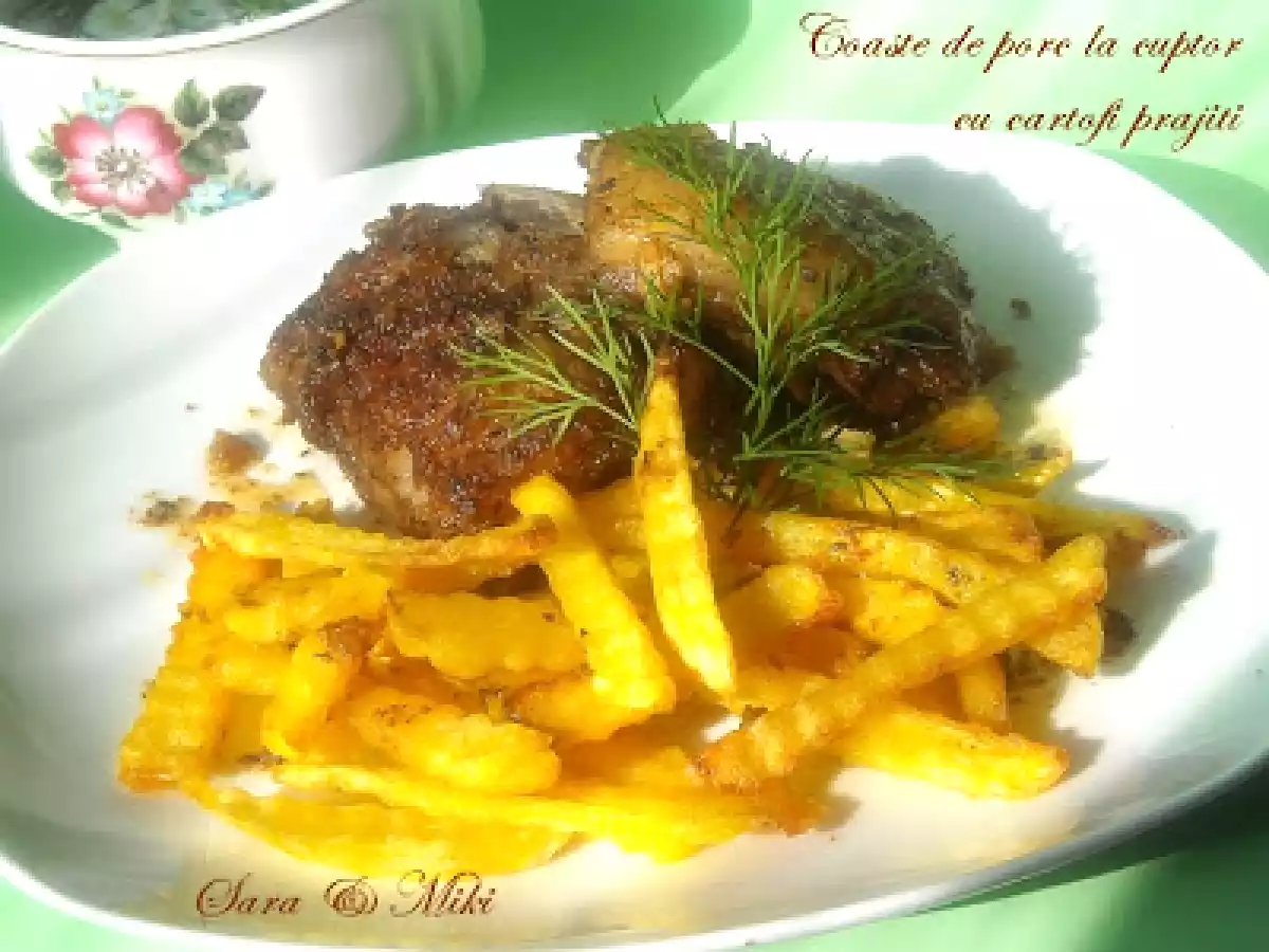 Coaste de porc la cuptor cu cartofi prajiti - poza 2