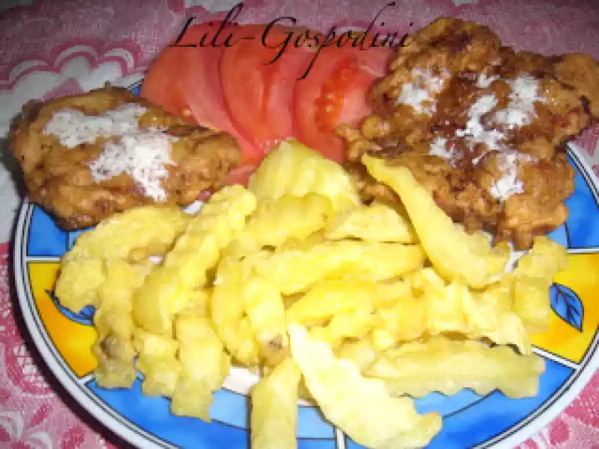 Snitele de porc cu cartofi pai (opariti)